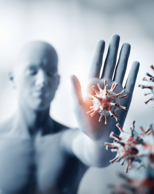 Krankmachende Zellen werden mit der Hand eines computergenerierten Menschen abgewehrt.